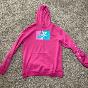 This is a hoodie from Nike brand and it’s a size large.